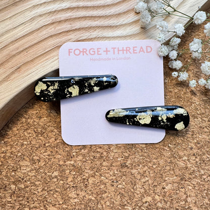 BLACK & GOLD HAIR SLIDES