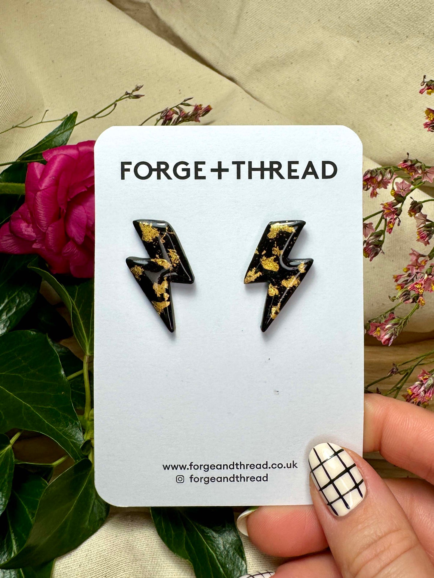 BLACK & GOLD LIGHTNING STUDS