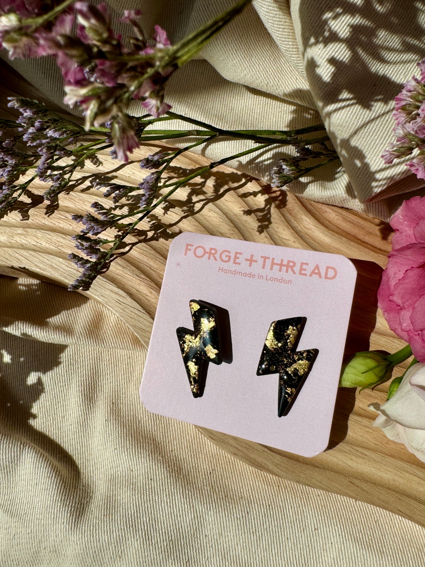 BLACK & GOLD LIGHTNING STUDS